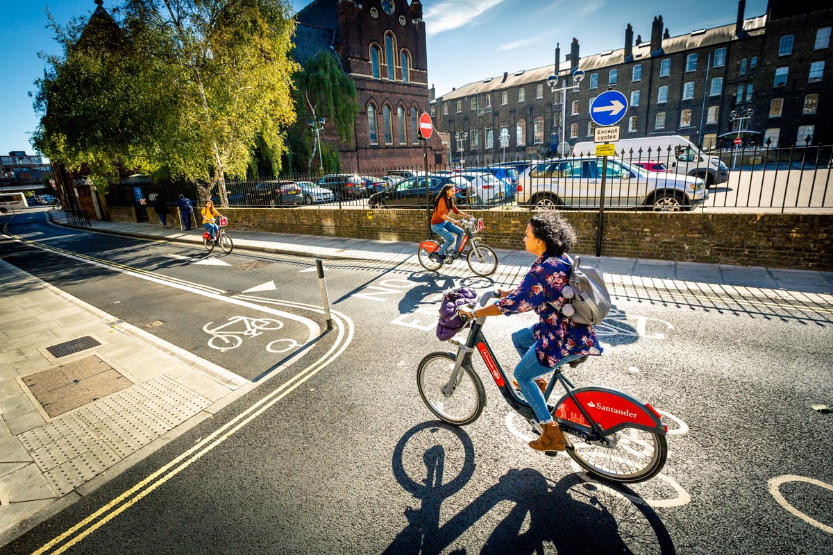 People cycling Santander Cyclies in London