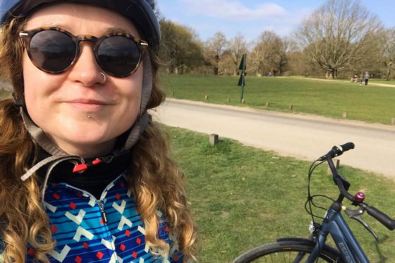 Aisling with her cycle in Richmond Park